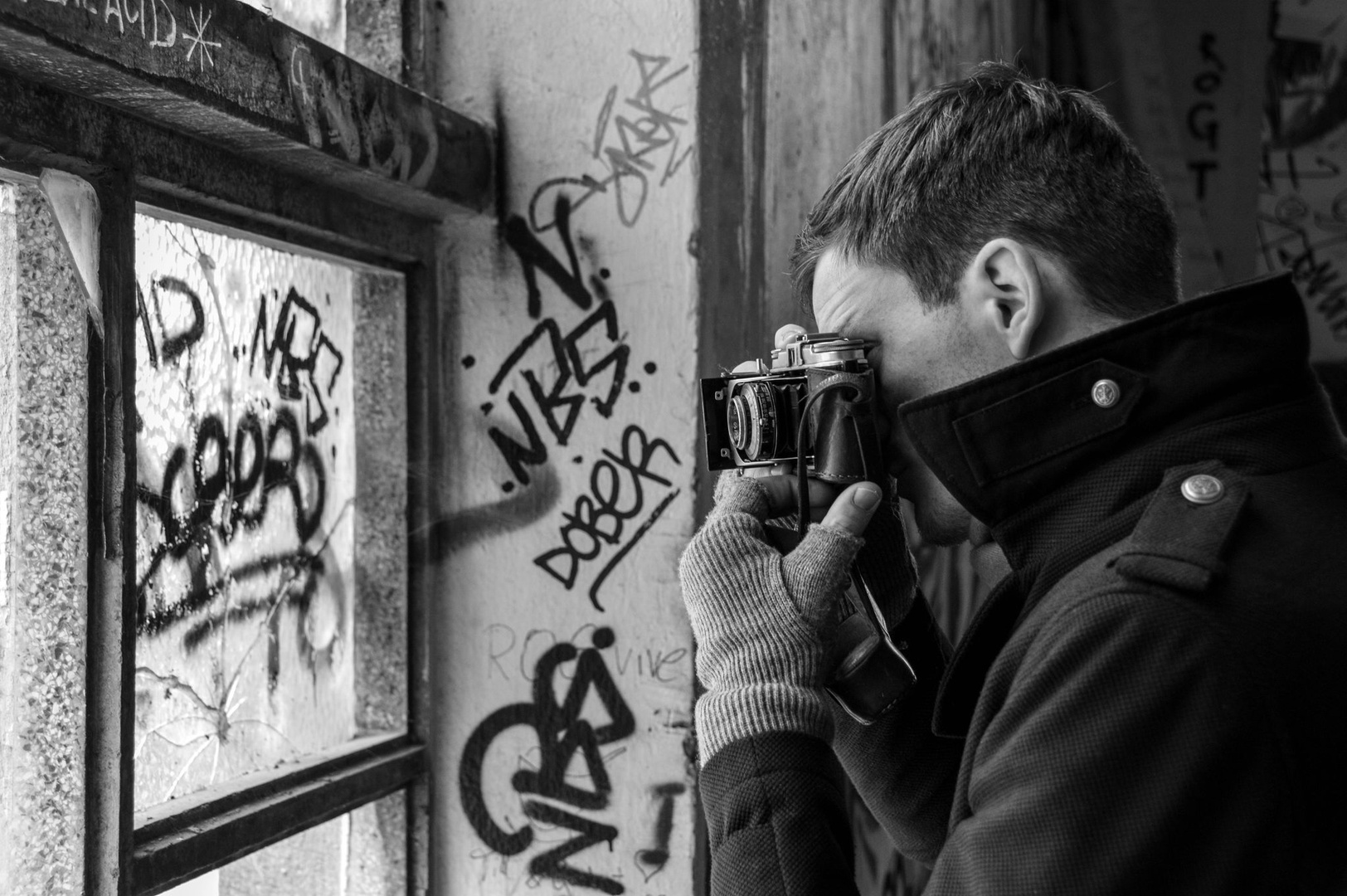 Young men... old camera by Jasmin Porčič
