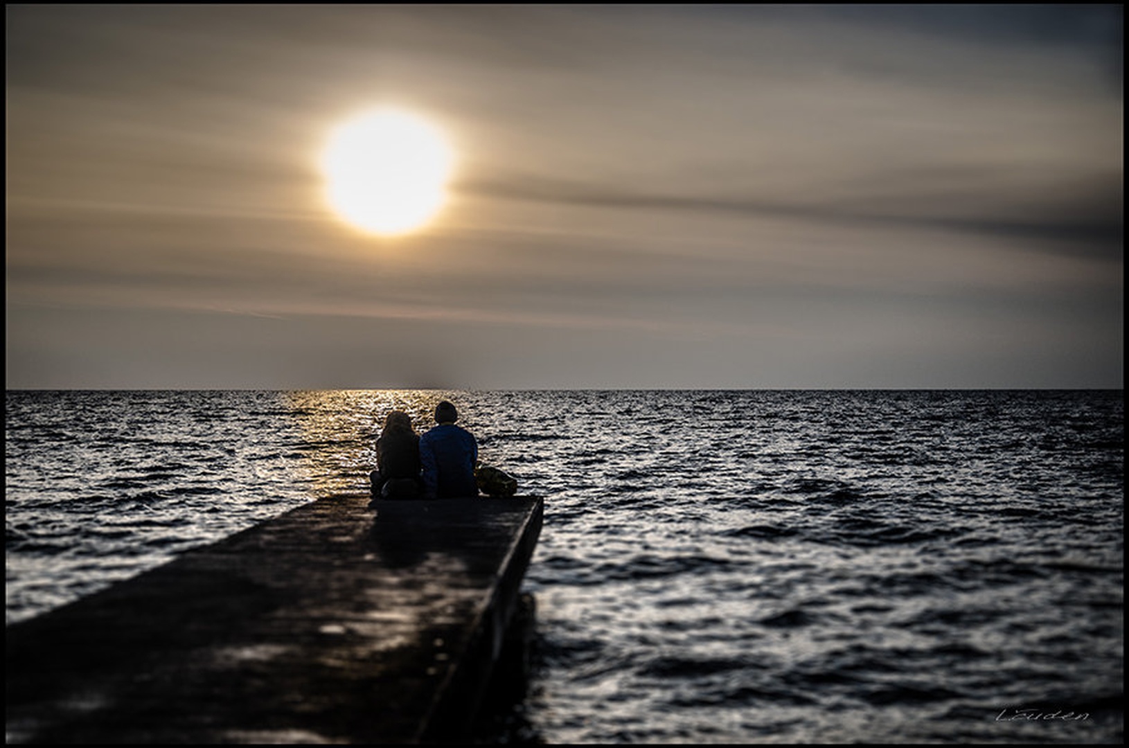 Couple in the sunset by Luka Čuden