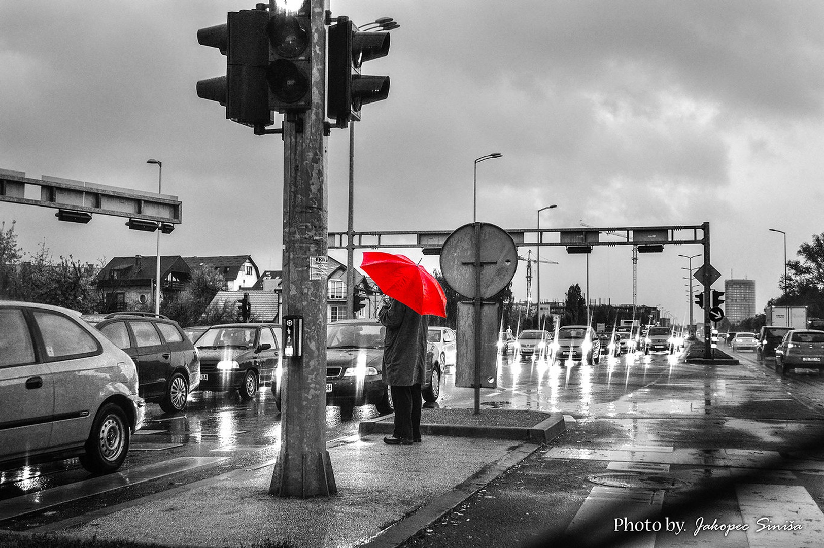 Red umbrella by Siniša Jakopec