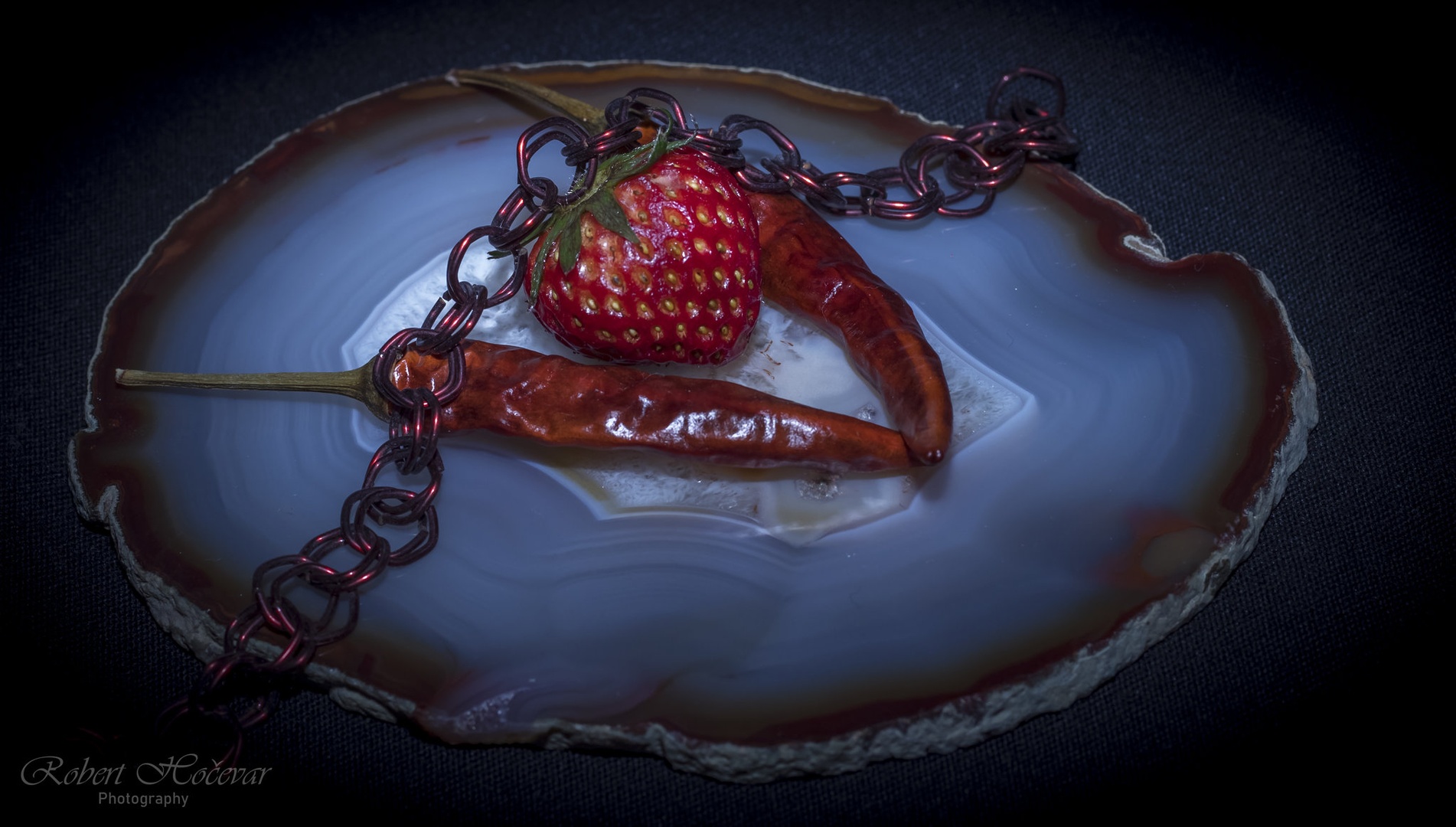 hot chili and sweet strawberry in quaranti by Robert Hočevar- Hoč