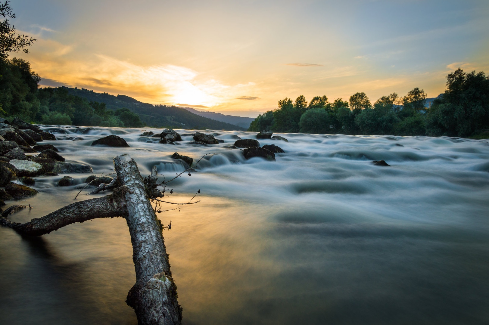 Sunset by the river. by Mato Novak