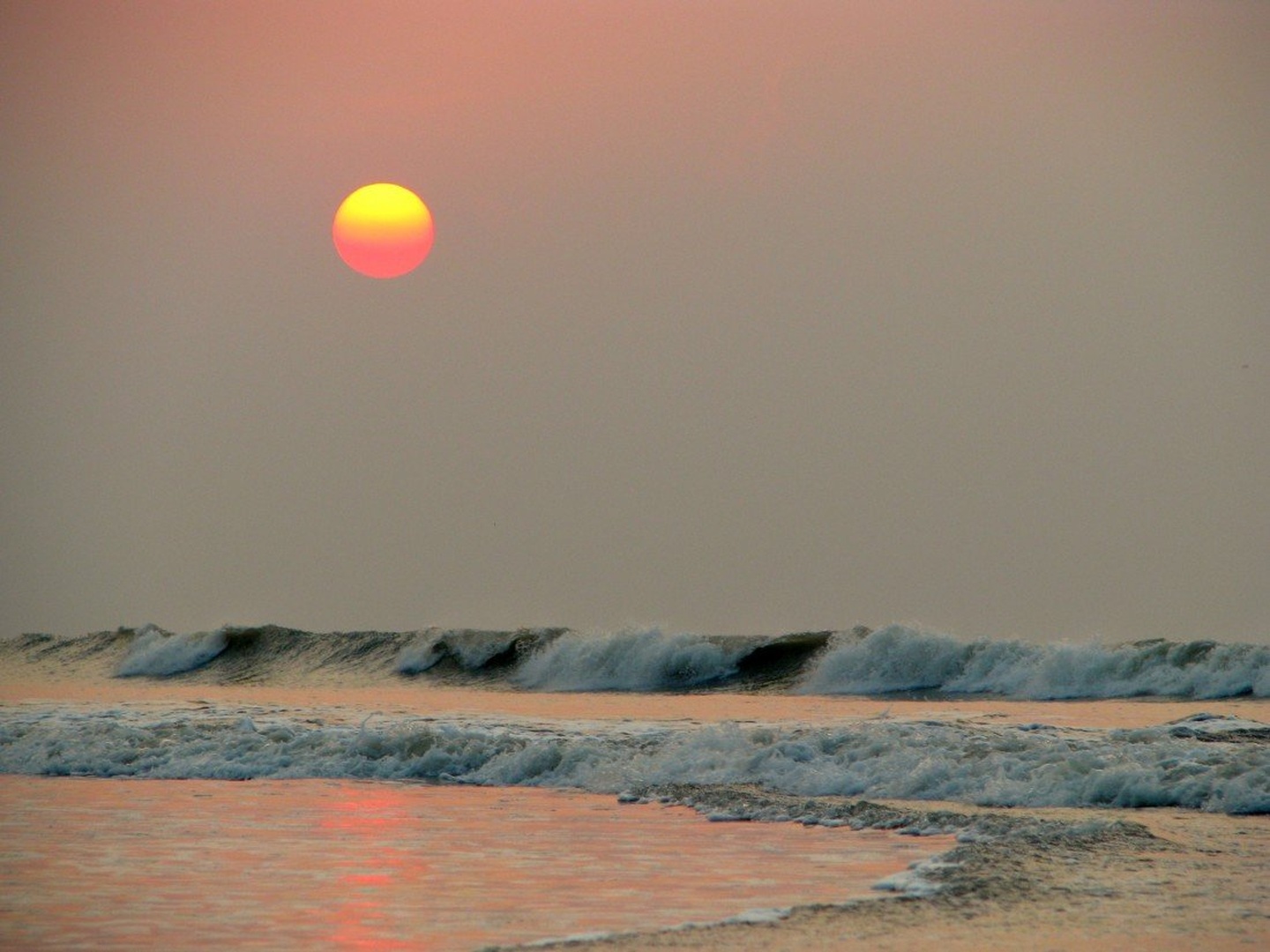 Sunrise on the beach by Nina Lozej