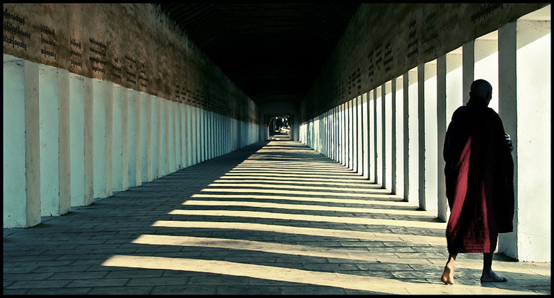 monk in a tunnel by stane jeger