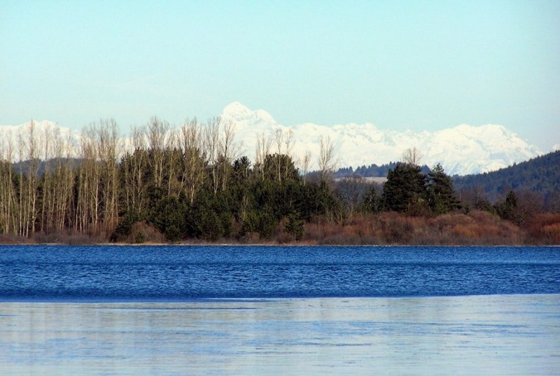 Triglav čuva Cerkniško jezero by Tine Šubic