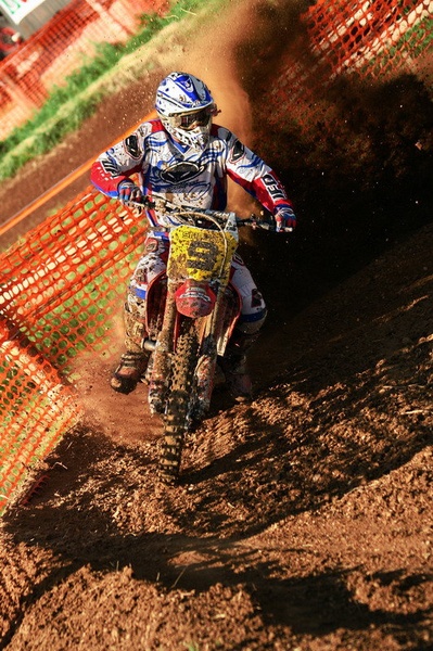 Between the light approaches a dirt rider by Peter