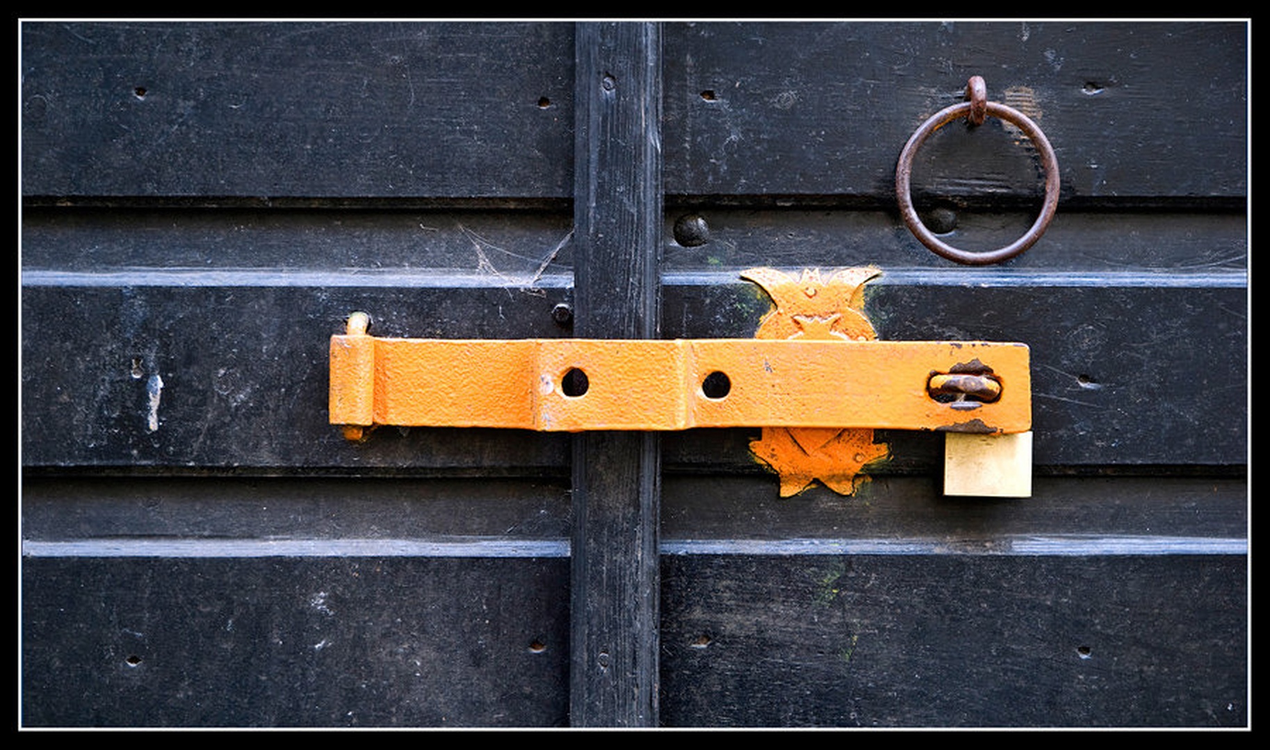 Padlock on wrong side. by Bojan Marušič