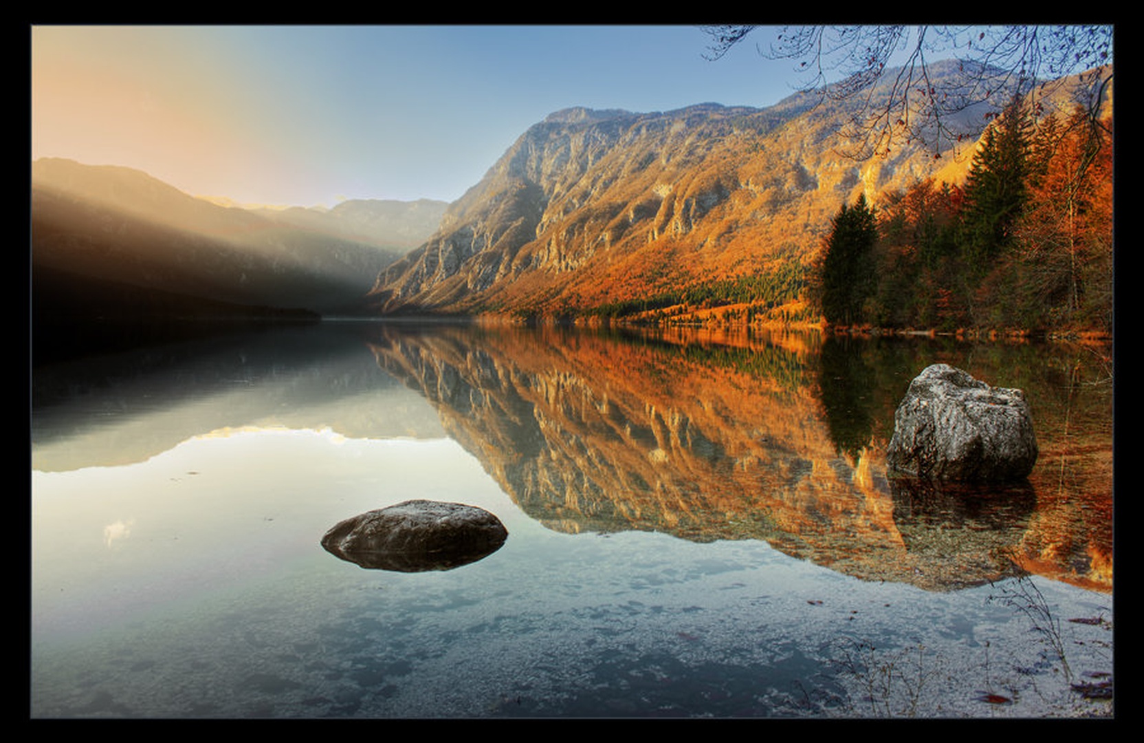 rocks in lake by Denis Sodrznik