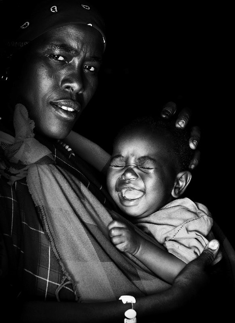 Nestled in Mother's arms by Goran Jovic