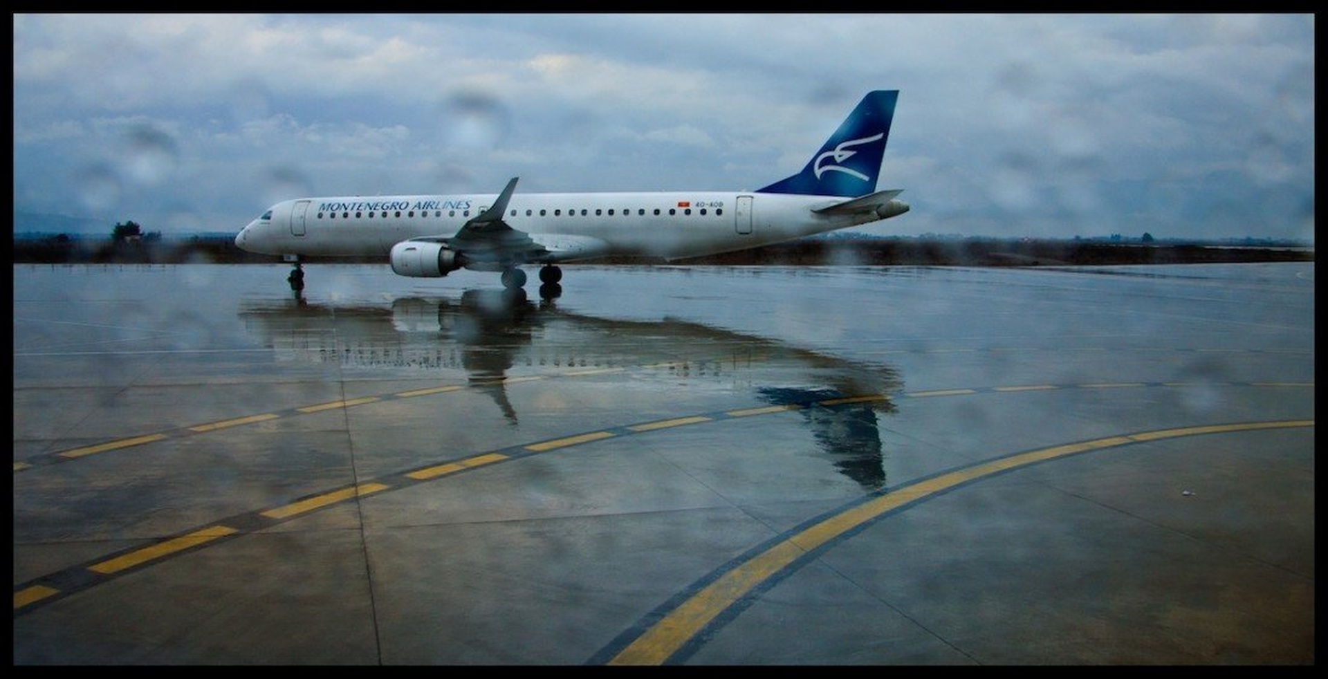 reflections on the tarmac by Jure P