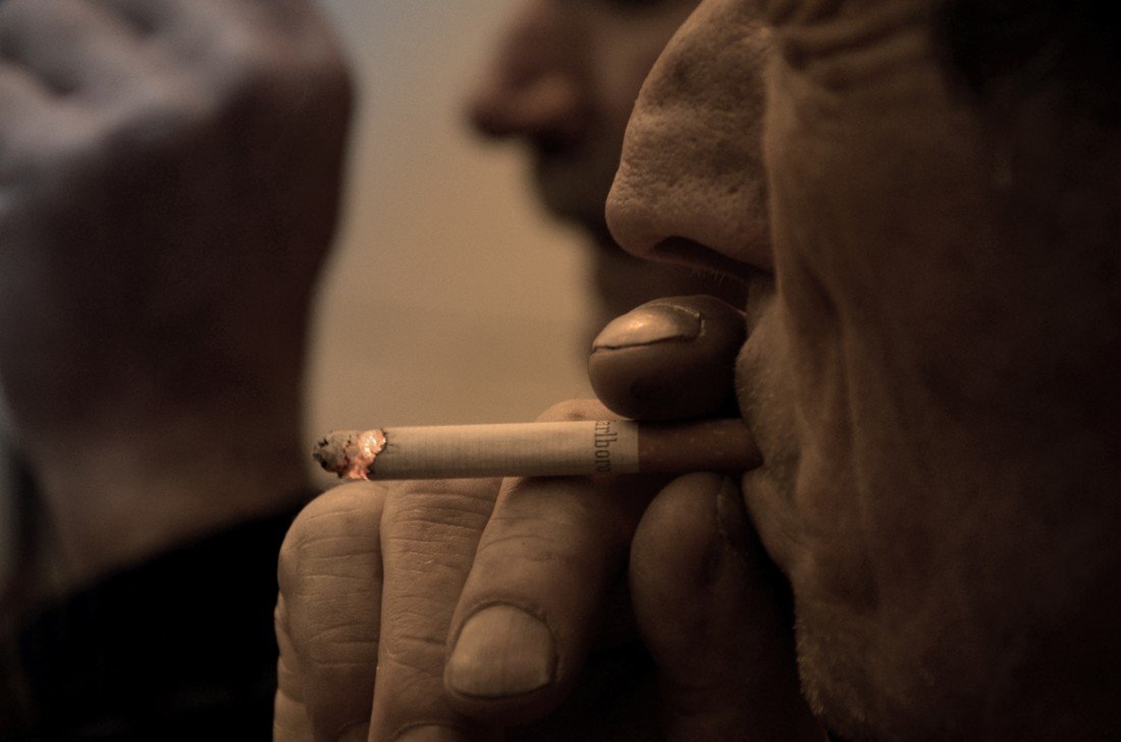 old man smoking by Marcel Rebernik